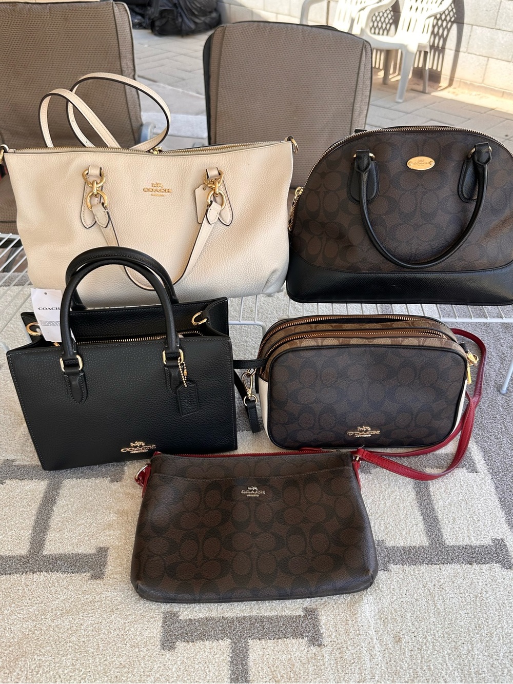Coach Maggie, Coach Jess camera bag , and 3 others